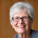 Headshot of a happy senior woman, Susan.